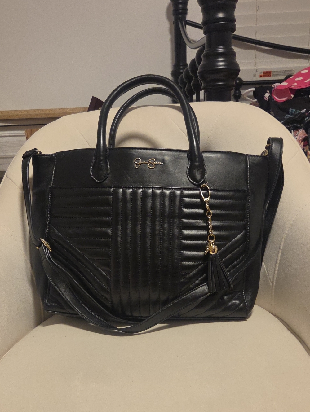 Jessica Simpson Black Quilted Tote with Tassel Charm